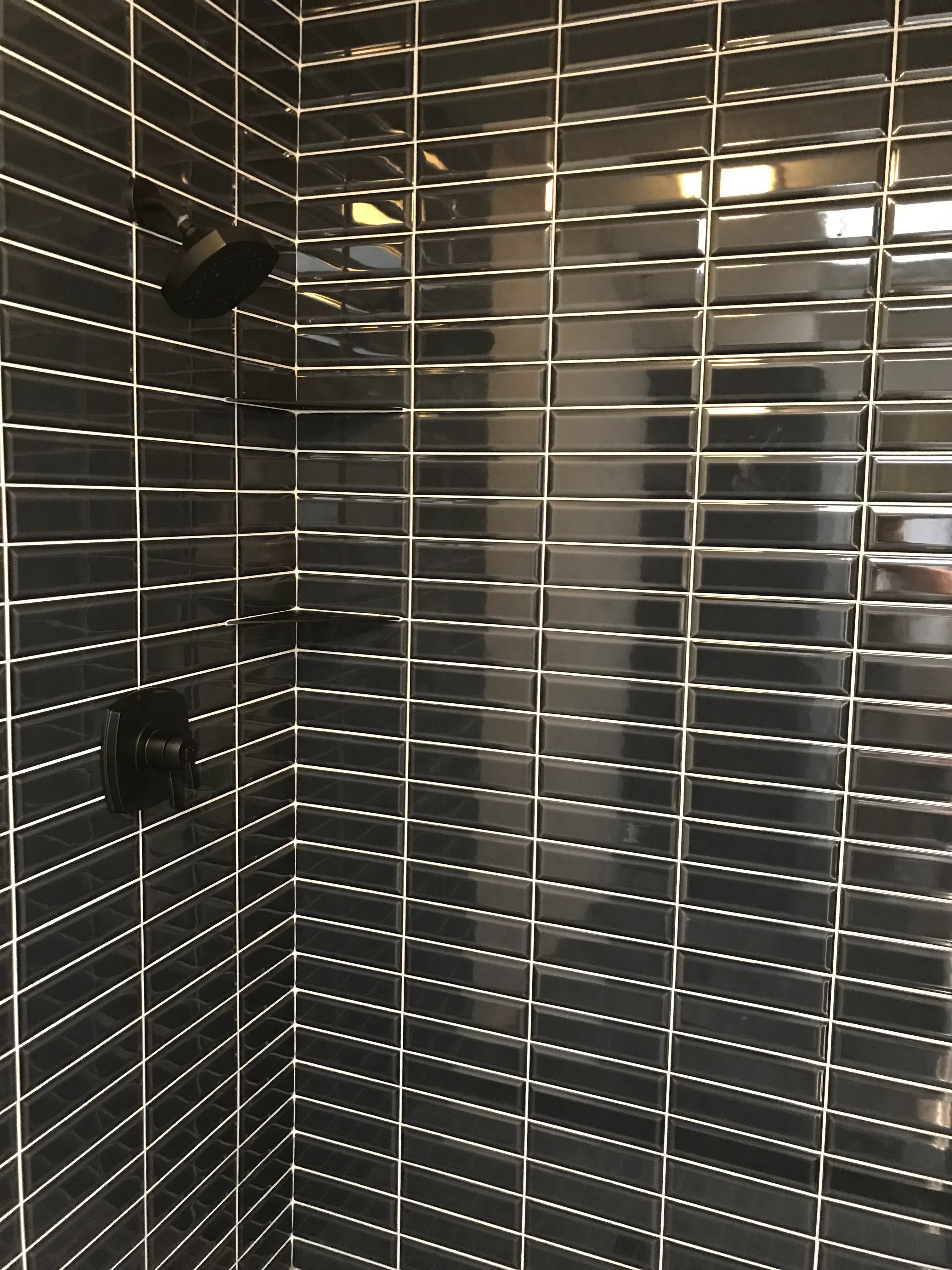 Herringbone subway tile shower installation in Shreveport Louisiana by 318 Tile Pro tile contractor